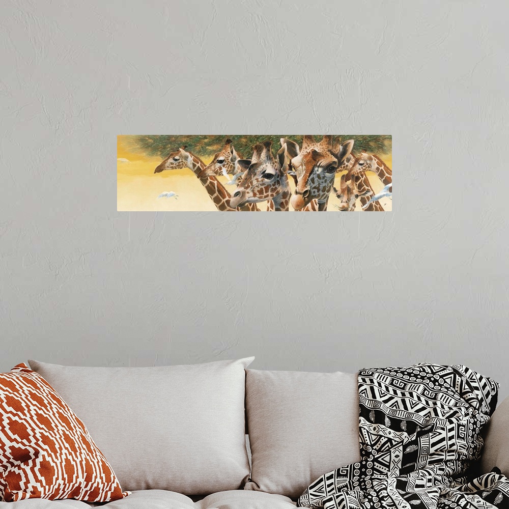 A bohemian room featuring Contemporary painting of a group of giraffes.