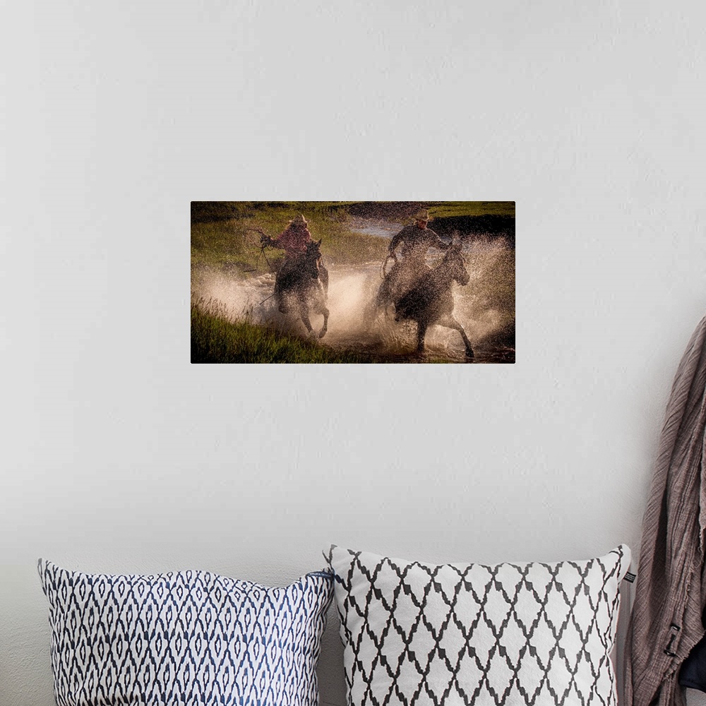 A bohemian room featuring Photograph of two cowgirls splashing through a steam on horseback with their lassos out.