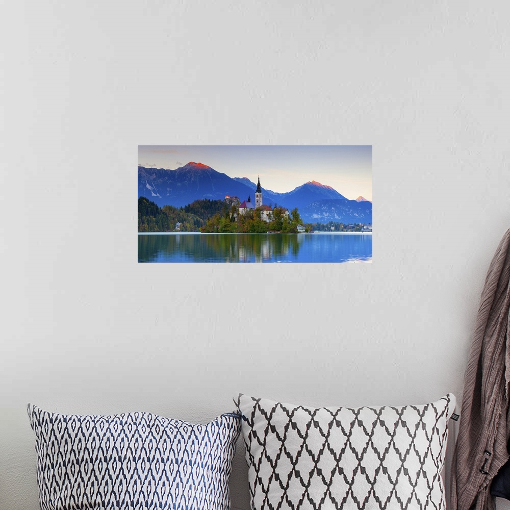 A bohemian room featuring Slovenia, Upper Carniola, Julian Alps, Triglav National Park, Bled, Bled Island with the Church o...