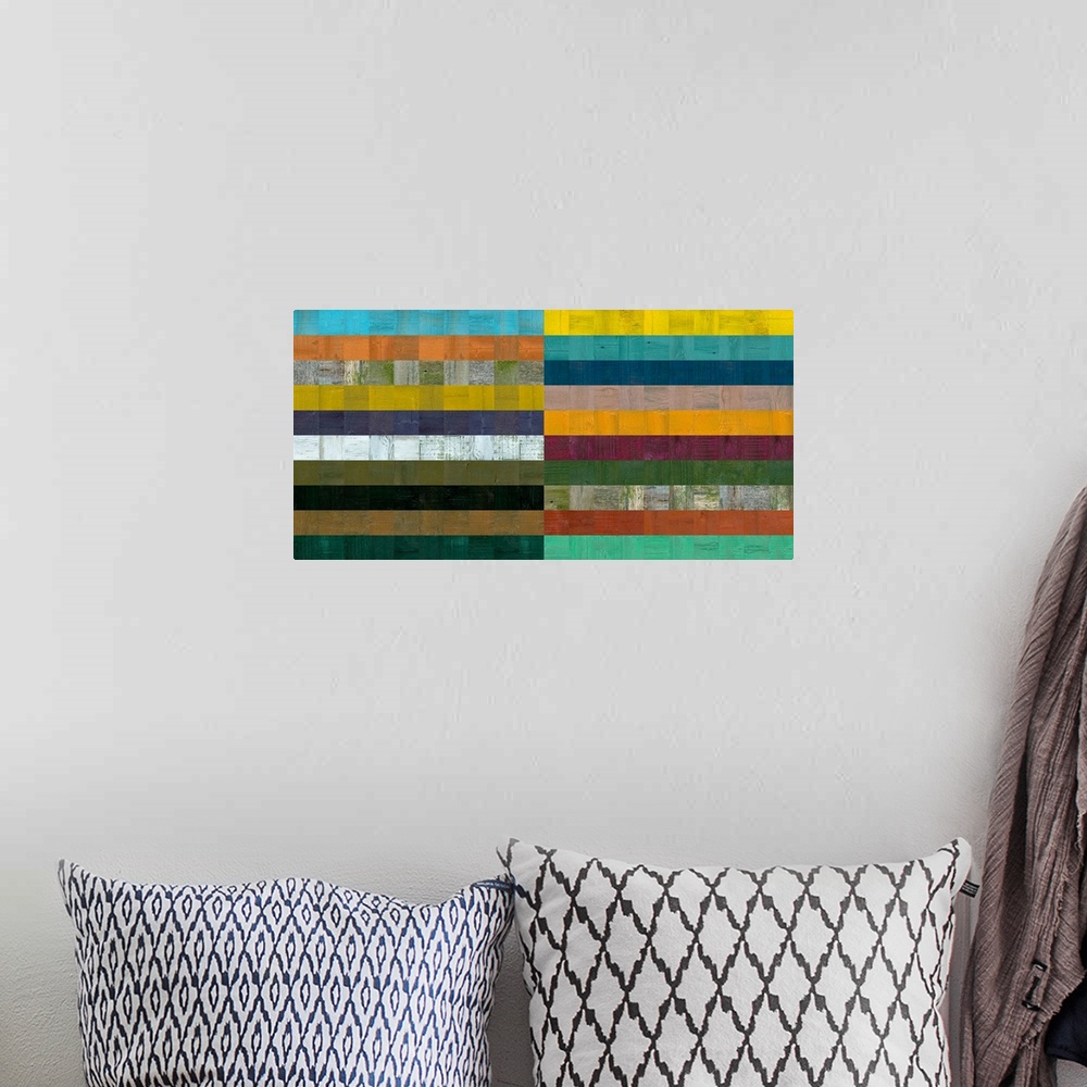 A bohemian room featuring Contemporary geometric home decor artwork in various colors.