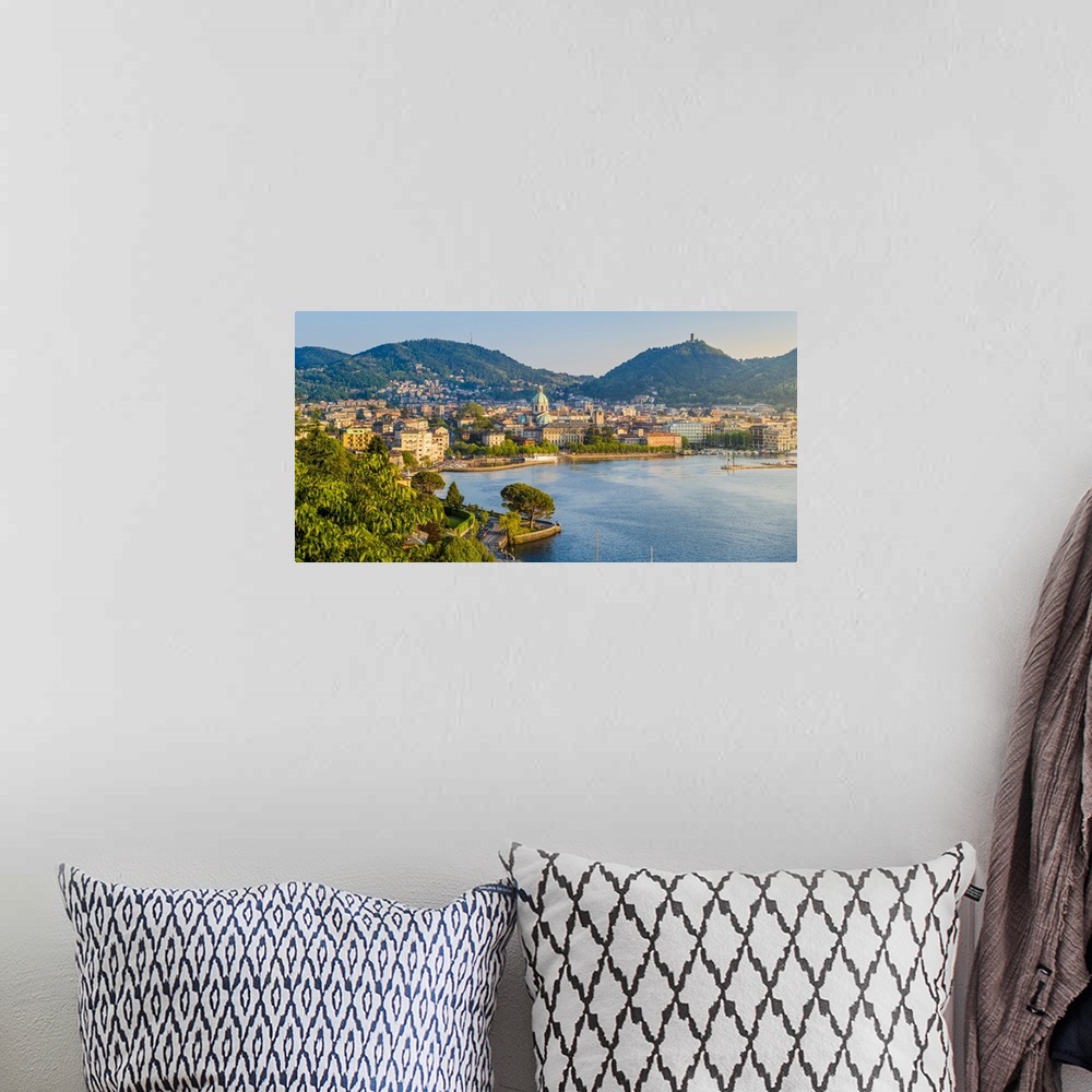 A bohemian room featuring Como, Lombardy, Italy. High angle view cityscape of Como and the lake front, with the Cathedral o...