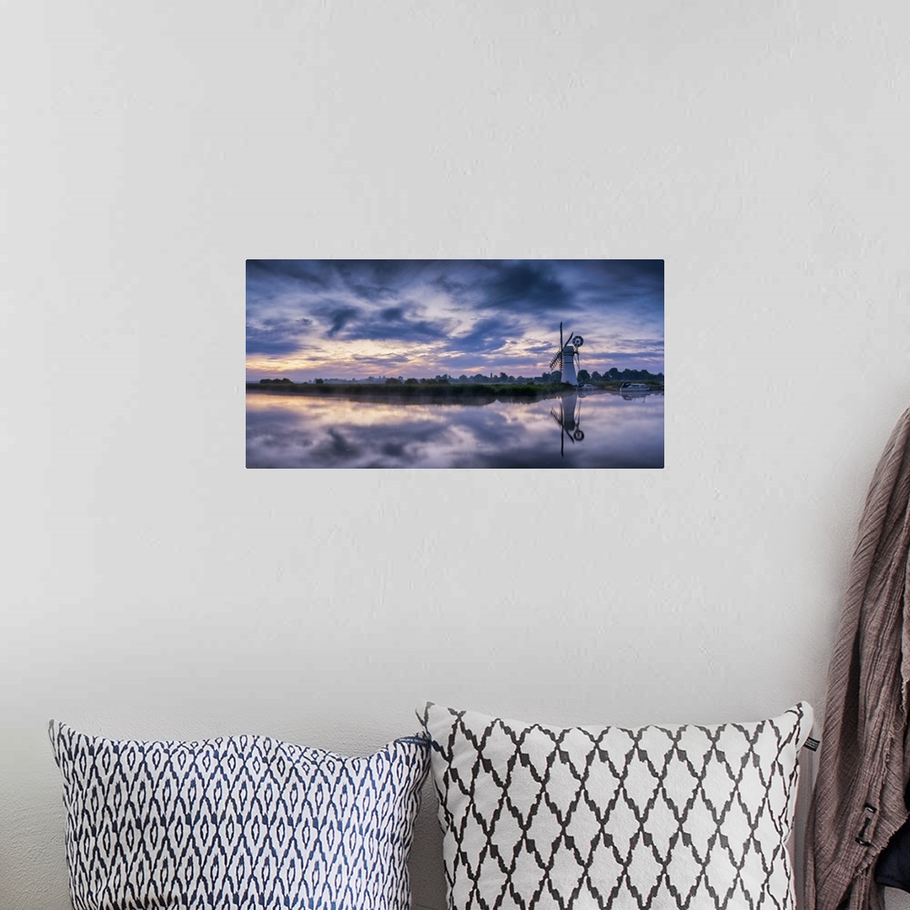 A bohemian room featuring Thurne Mill & Clouds Reflecting in River Thurne, Norfolk Broads, Norfolk, England