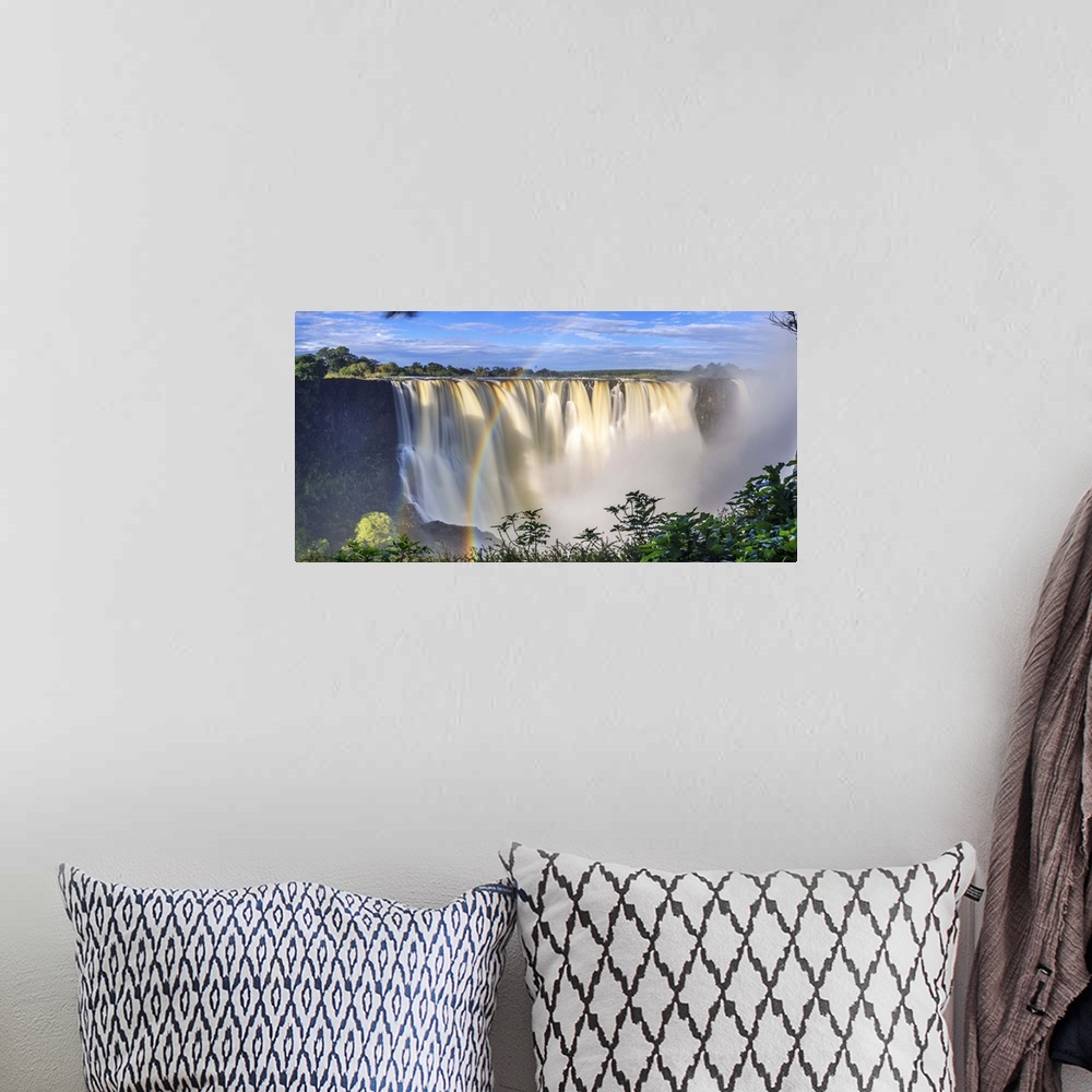 A bohemian room featuring Zimbabwe, Victoria Falls, Victoria Falls National Park during rainy season (UNESCO Site).