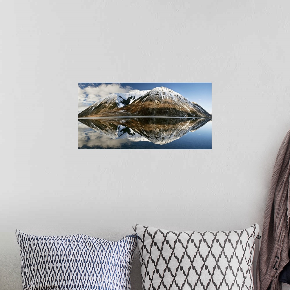 A bohemian room featuring Mountains reflecting in Lake Pearson in winter, Castle Hill Basin, Canterbury, New Zealand