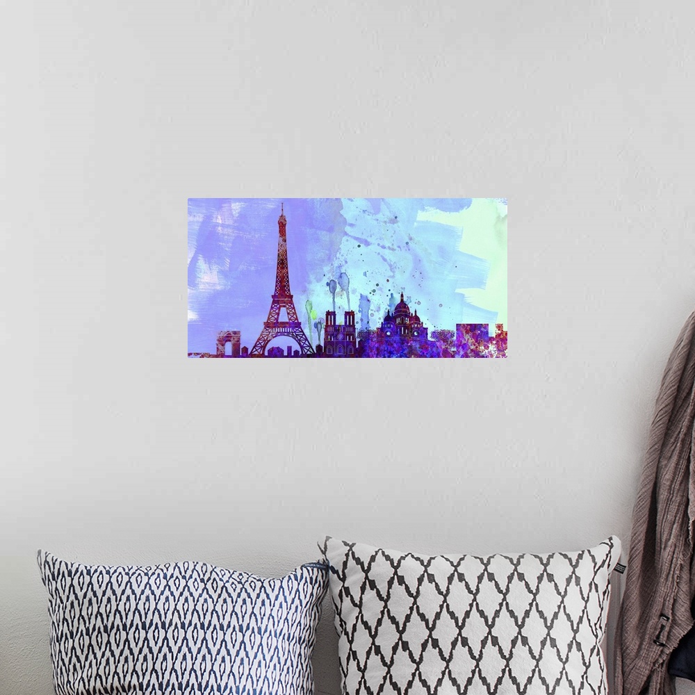A bohemian room featuring Watercolor artwork of the silhouette of the Paris city skyline.