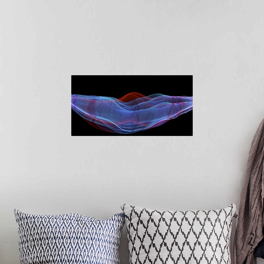 A bohemian room featuring A macro photograph of an abstract shape in multiple colors against a black background.