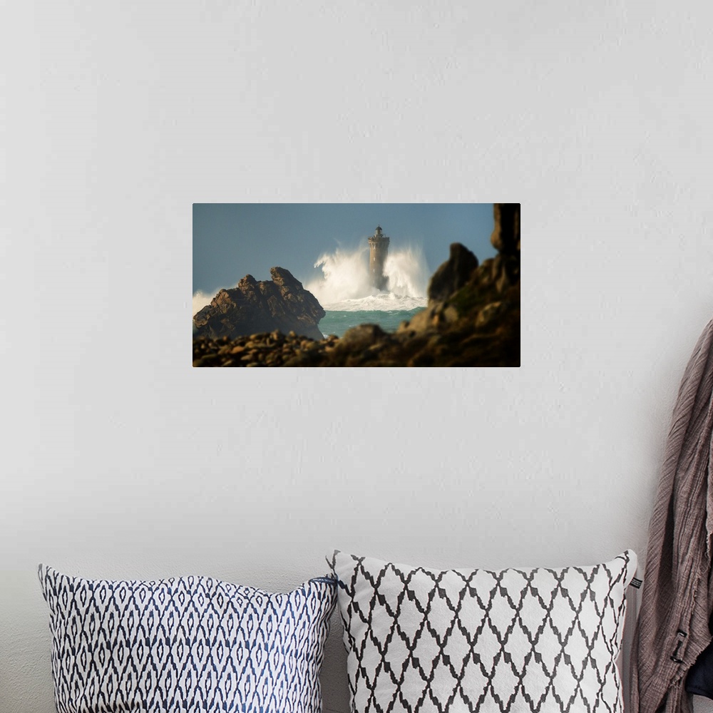 A bohemian room featuring Panoramic view of "Le Four" lighthouse in the north coast of Brittany in France in Porspoder.