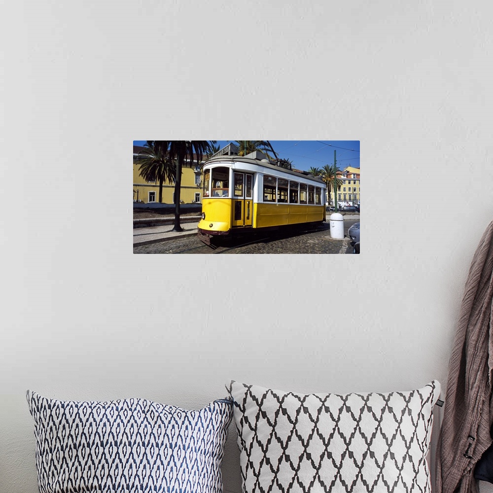 A bohemian room featuring Cable car in a city Lisbon Portugal