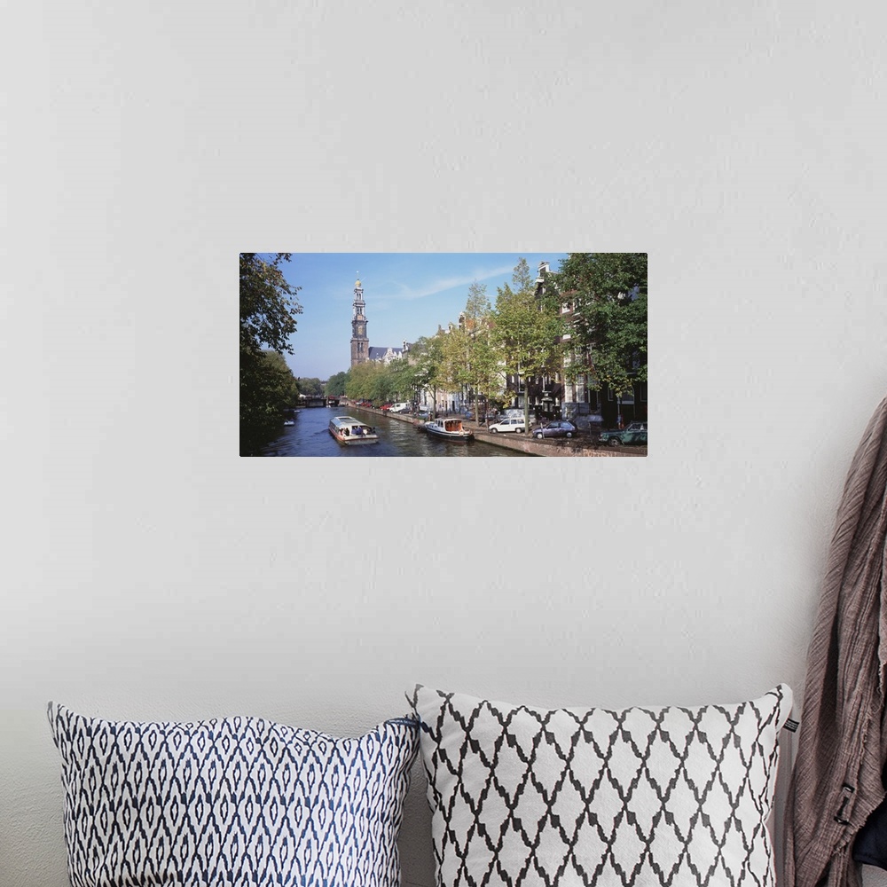 A bohemian room featuring Church along a channel in Amsterdam Netherlands