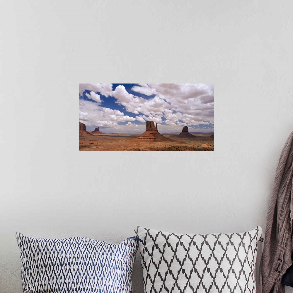 A bohemian room featuring Horizontal photo on canvas of rock monuments in a desert in Arizona.