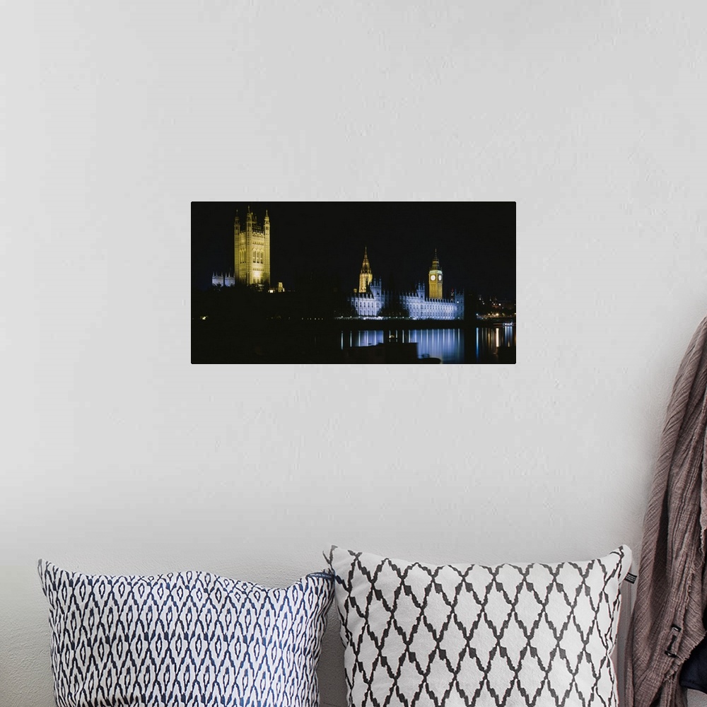 A bohemian room featuring Reflection of buildings in a river lit up at night, Big Ben, House Of Parliament, London, England