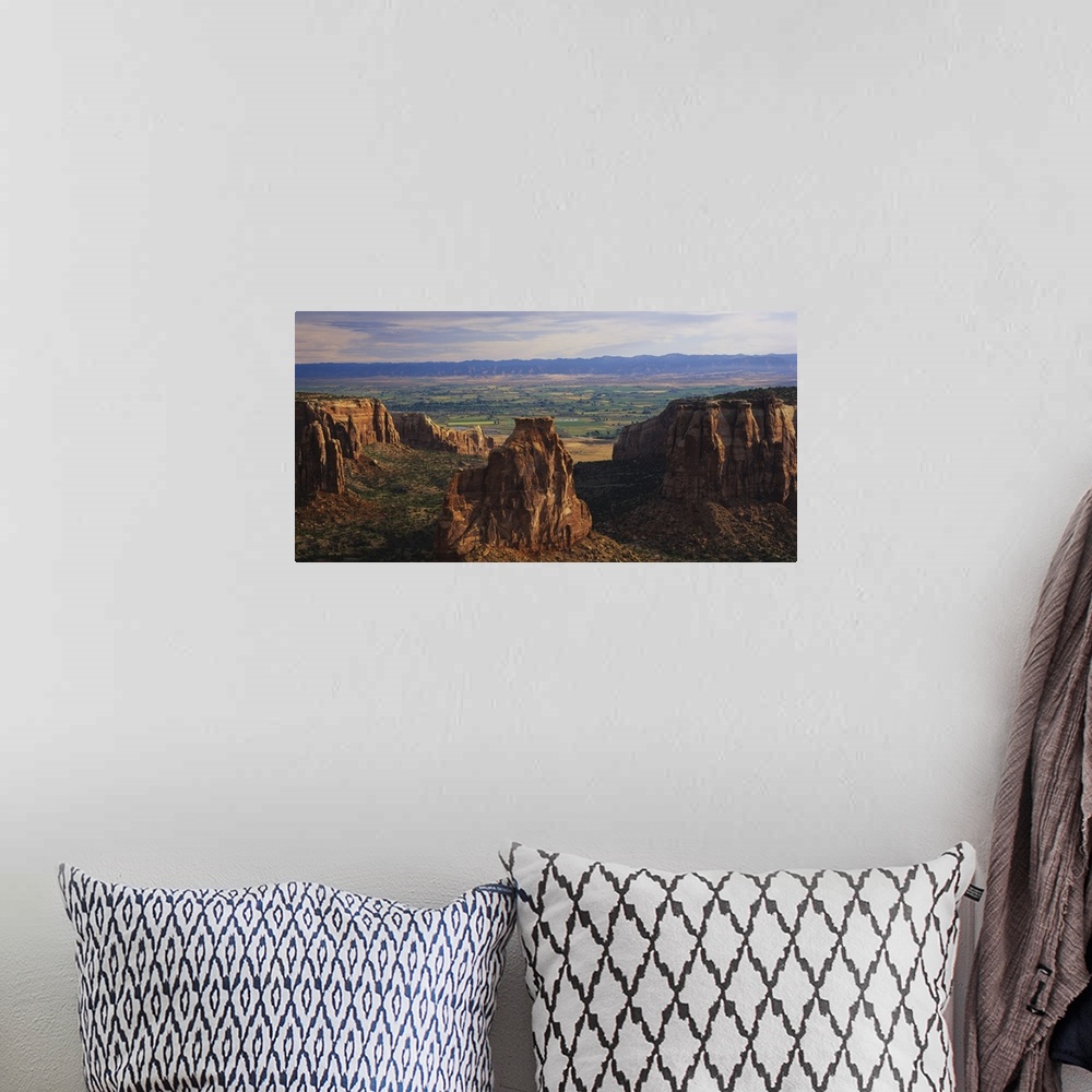A bohemian room featuring Big, landscape photograph of large rocks of the Colorado National Monument in Grand Junction, Col...