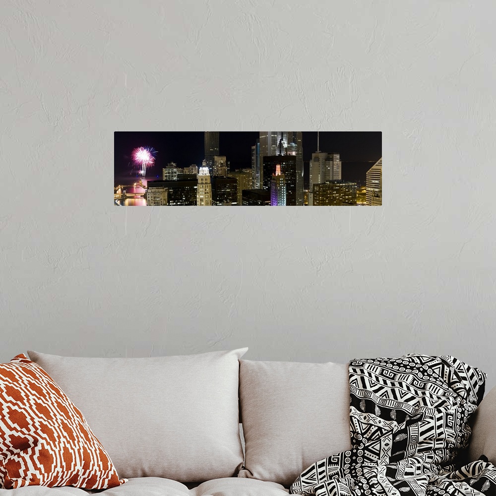 A bohemian room featuring Skyscrapers and firework display in a city at night, Lake Michigan, Chicago, Illinois,