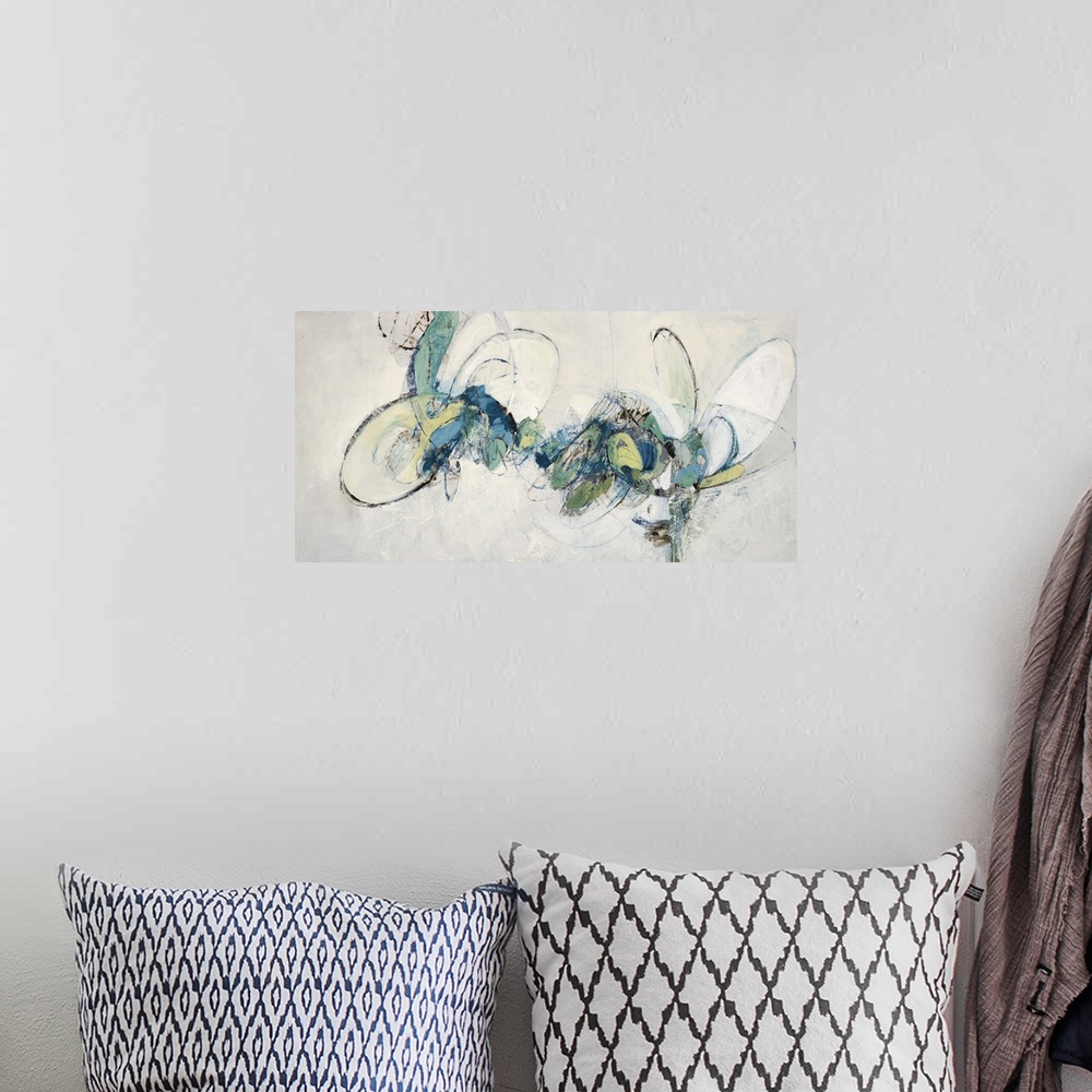 A bohemian room featuring Contemporary abstract painting using teal tones against a neutral background.