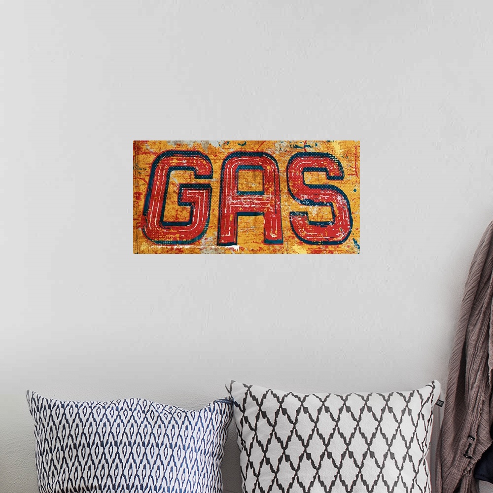 A bohemian room featuring Graphic rusty wall art of distressed typography with the the word GAS large and in center on a ye...