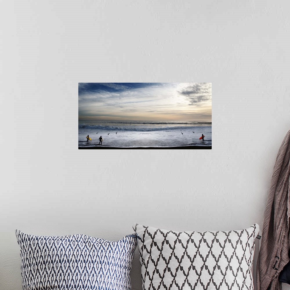 A bohemian room featuring Surfers in Malibu looking at the waves