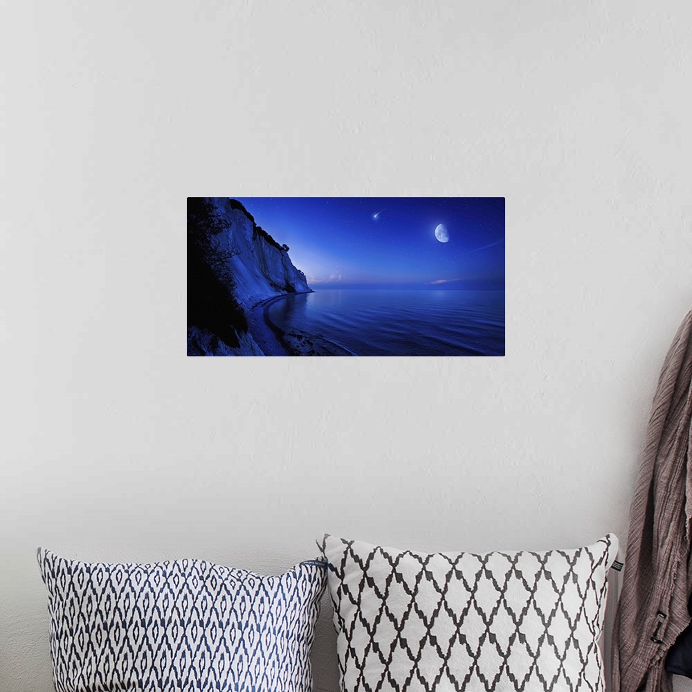 A bohemian room featuring Moon rising over tranquil sea and Mons Klint cliffs against starry sky with falling meteorite, De...