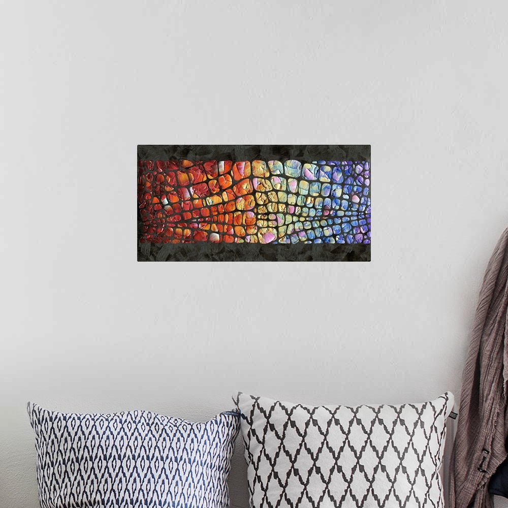 A bohemian room featuring Abstract painting with a multicolored scale pattern on a black textured background.
