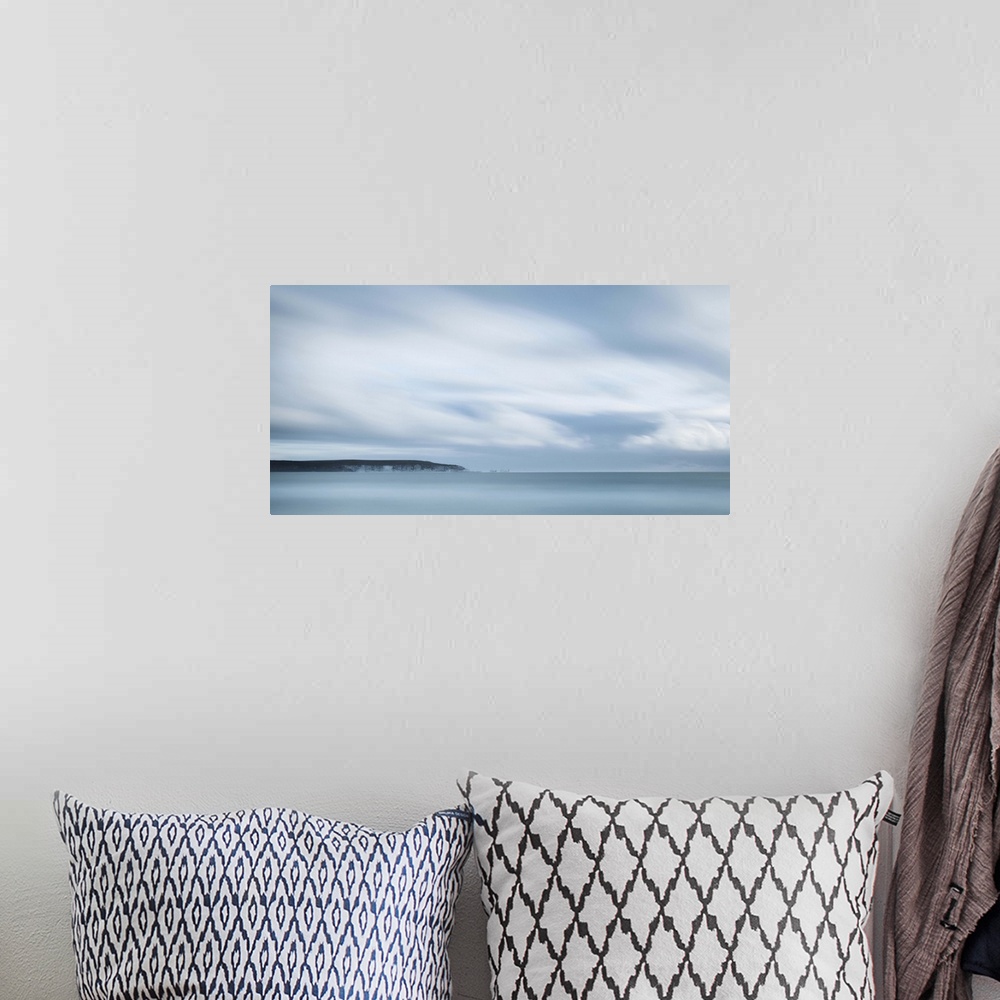 A bohemian room featuring Long exposure seascape looking towards an island