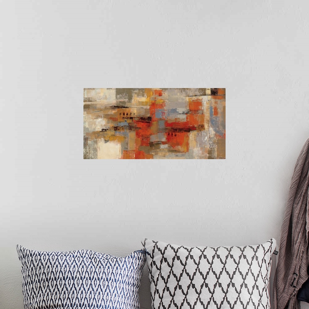 A bohemian room featuring Large abstract art composed of different square and rectangular sized patches of earth tones sitt...