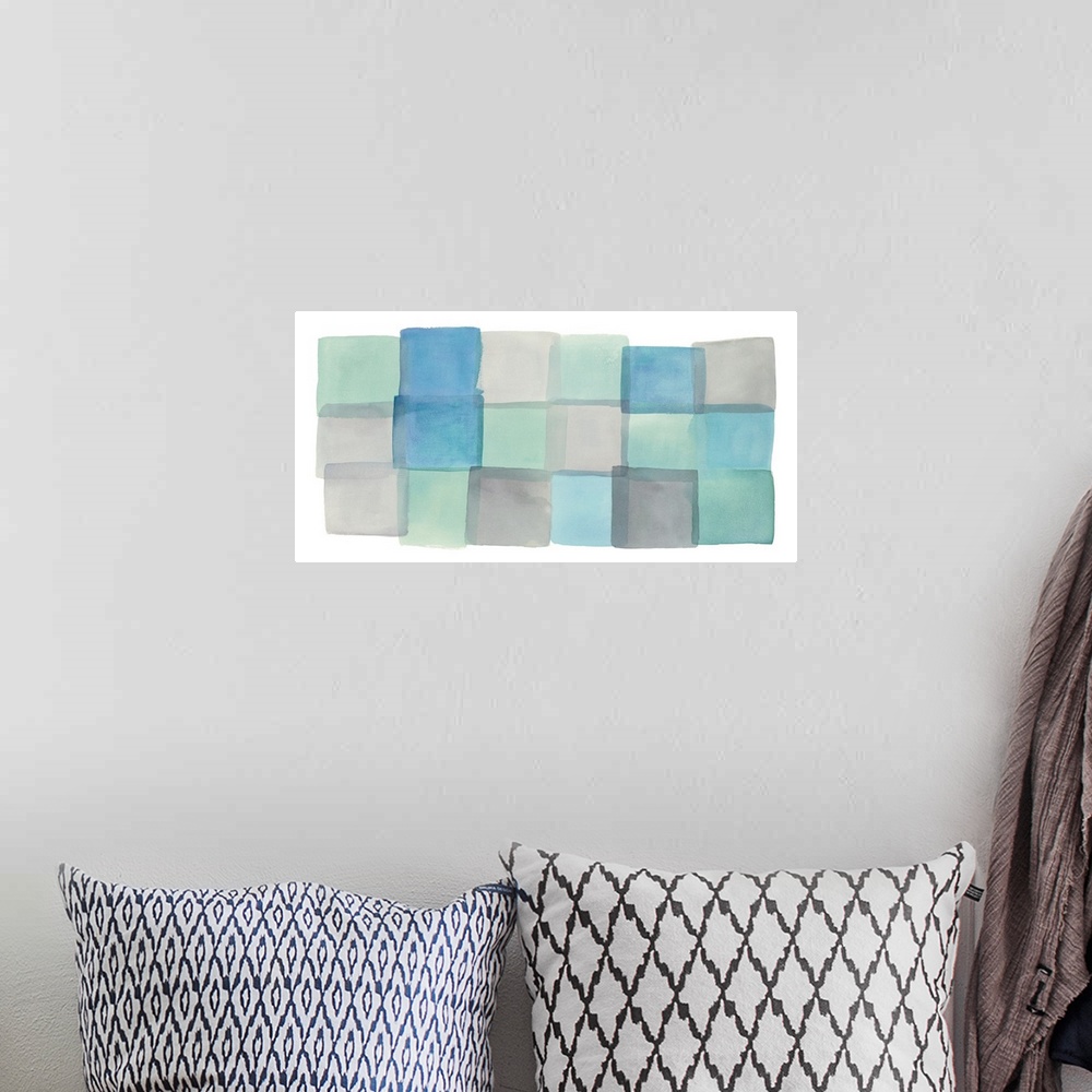 A bohemian room featuring Pastel watercolor painting of squares in blue and teal shades.