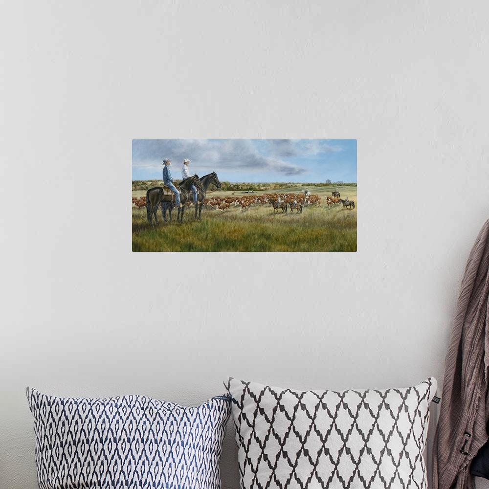 A bohemian room featuring Contemporary painting of cowboys sitting atop their horses overlooking their herd.