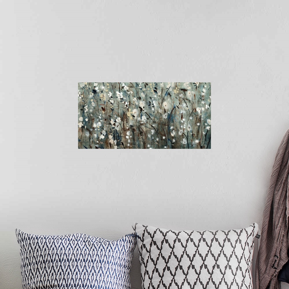 A bohemian room featuring Contemporary painting of several flowers in a field, in blue and grey tones.