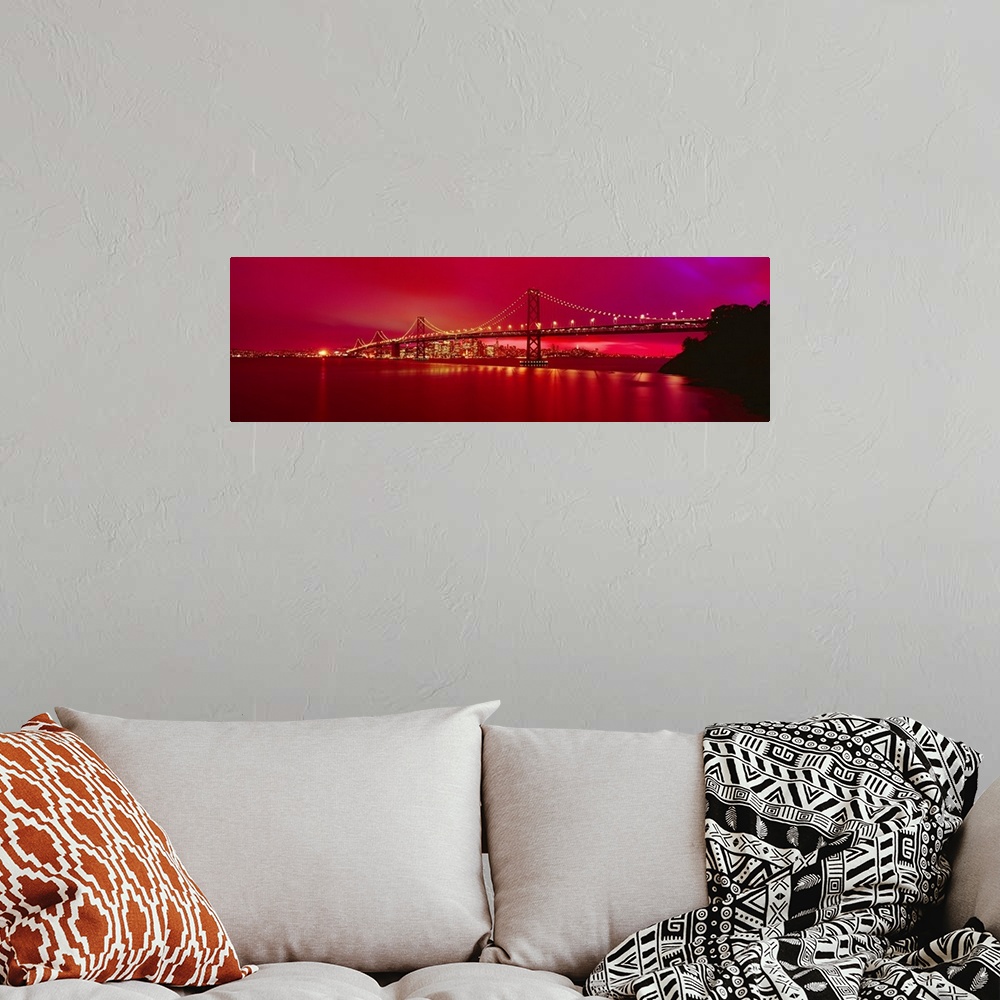 A bohemian room featuring This panoramic landscape photograph was taken at just time of day to turn the sky a brilliant hot...