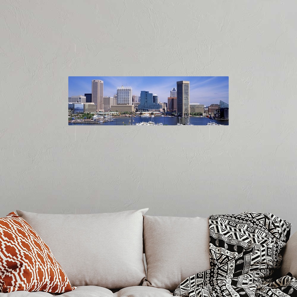 A bohemian room featuring Panoramic image of the harbor area of downtown Baltimore, Maryland with sailboats and yachts park...