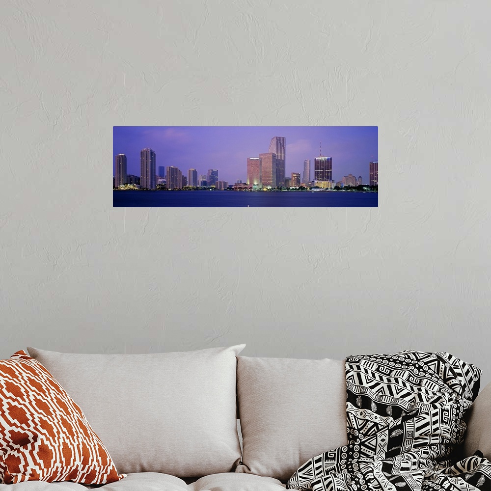 A bohemian room featuring Skyscrapers on the waterfront at dusk, Miami, Florida