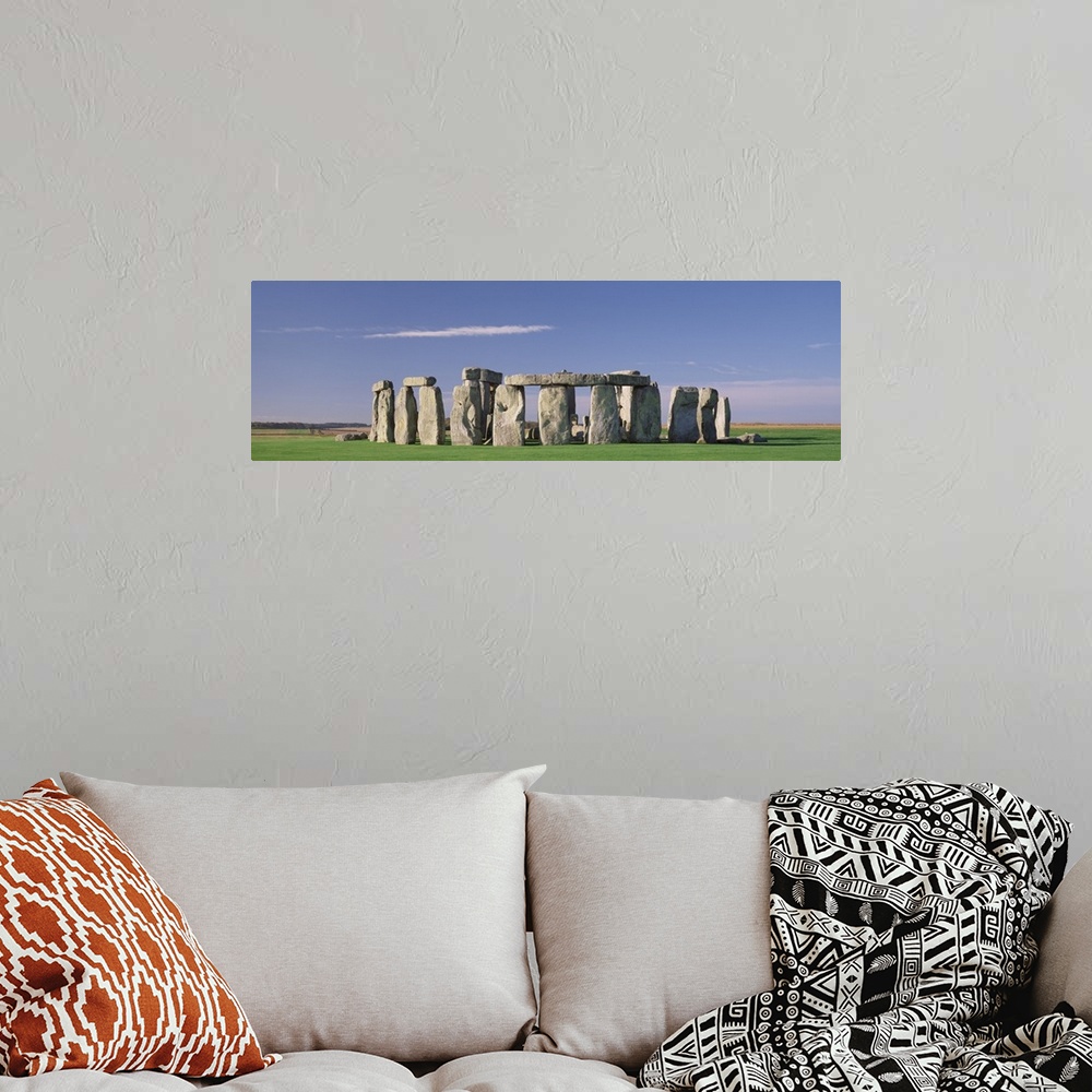 A bohemian room featuring Panorama of the Stonehenge monument in Wiltshire, England.