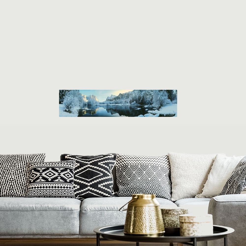 A bohemian room featuring Giant, panoramic photograph of calm waters surrounded by snow covered trees and mountains in Yose...