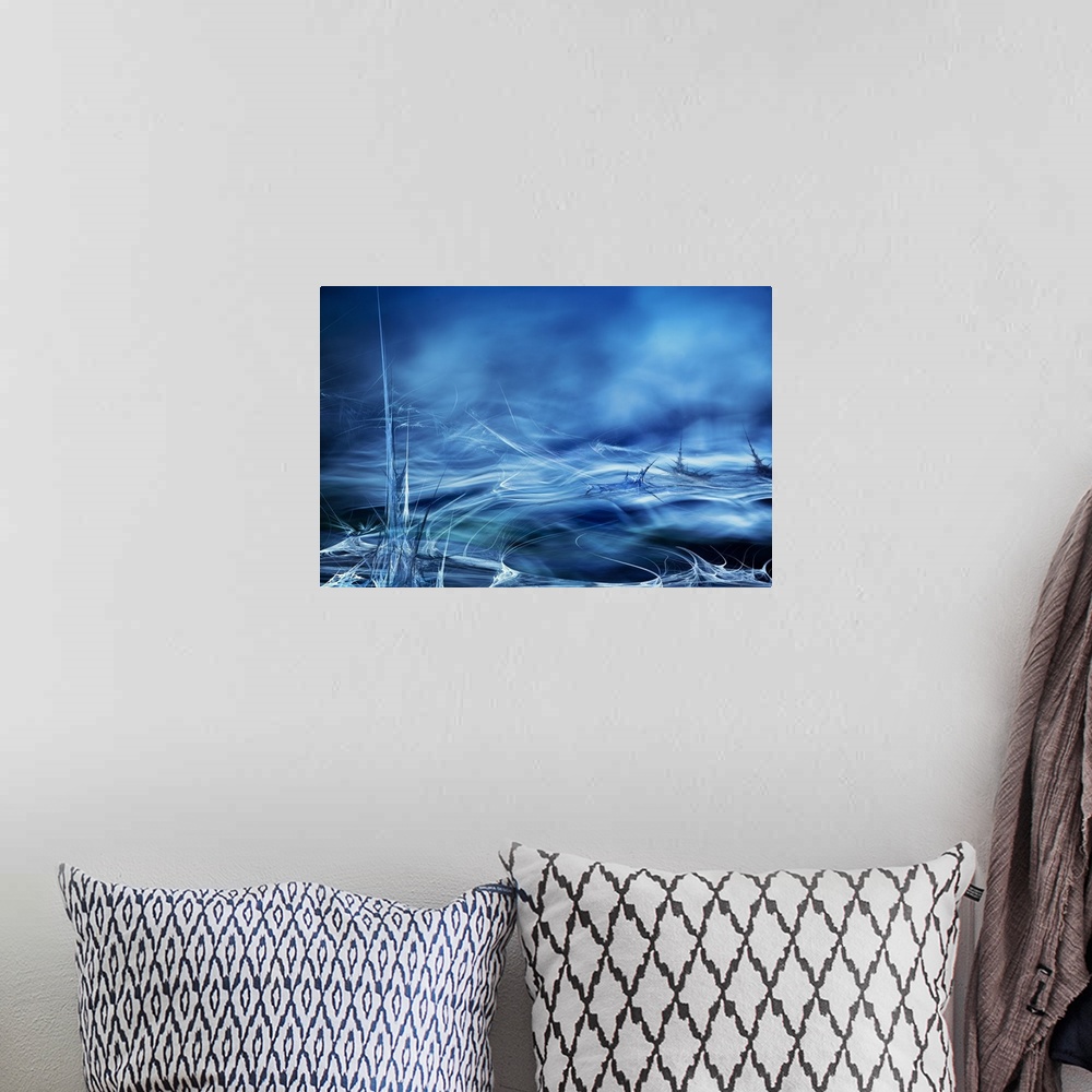 A bohemian room featuring Abstract digital art with blue, black, and white hues resembling moving water.