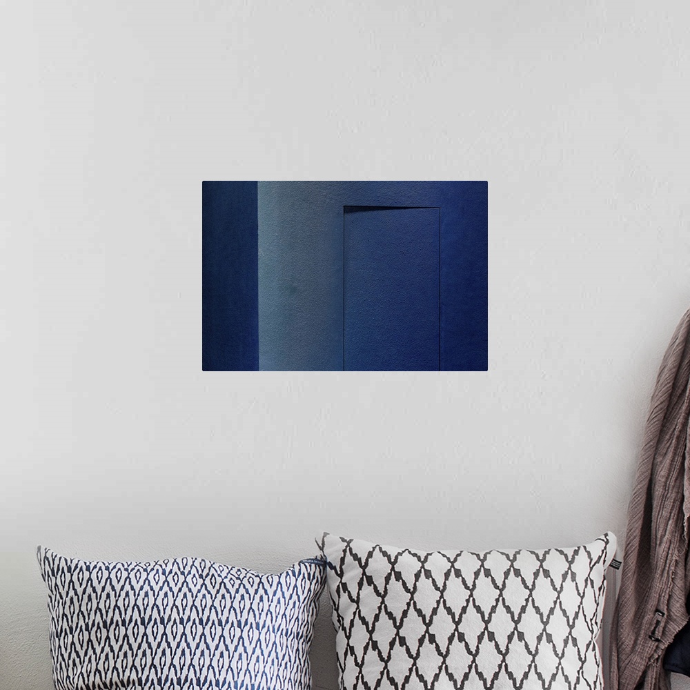 A bohemian room featuring Blue Minimalism Or A Secret Door