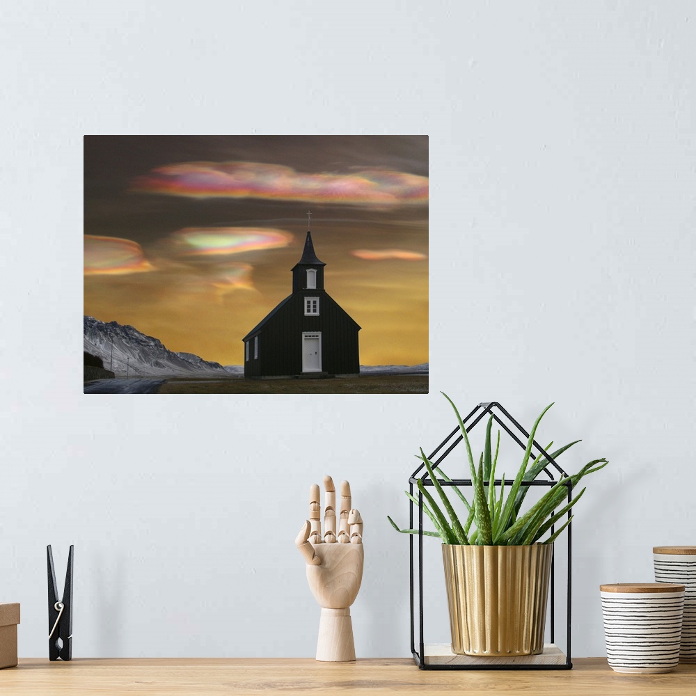 A bohemian room featuring A church in Iceland with Polar stratospheric clouds, also known as nacreous clouds or "glitsky," ...