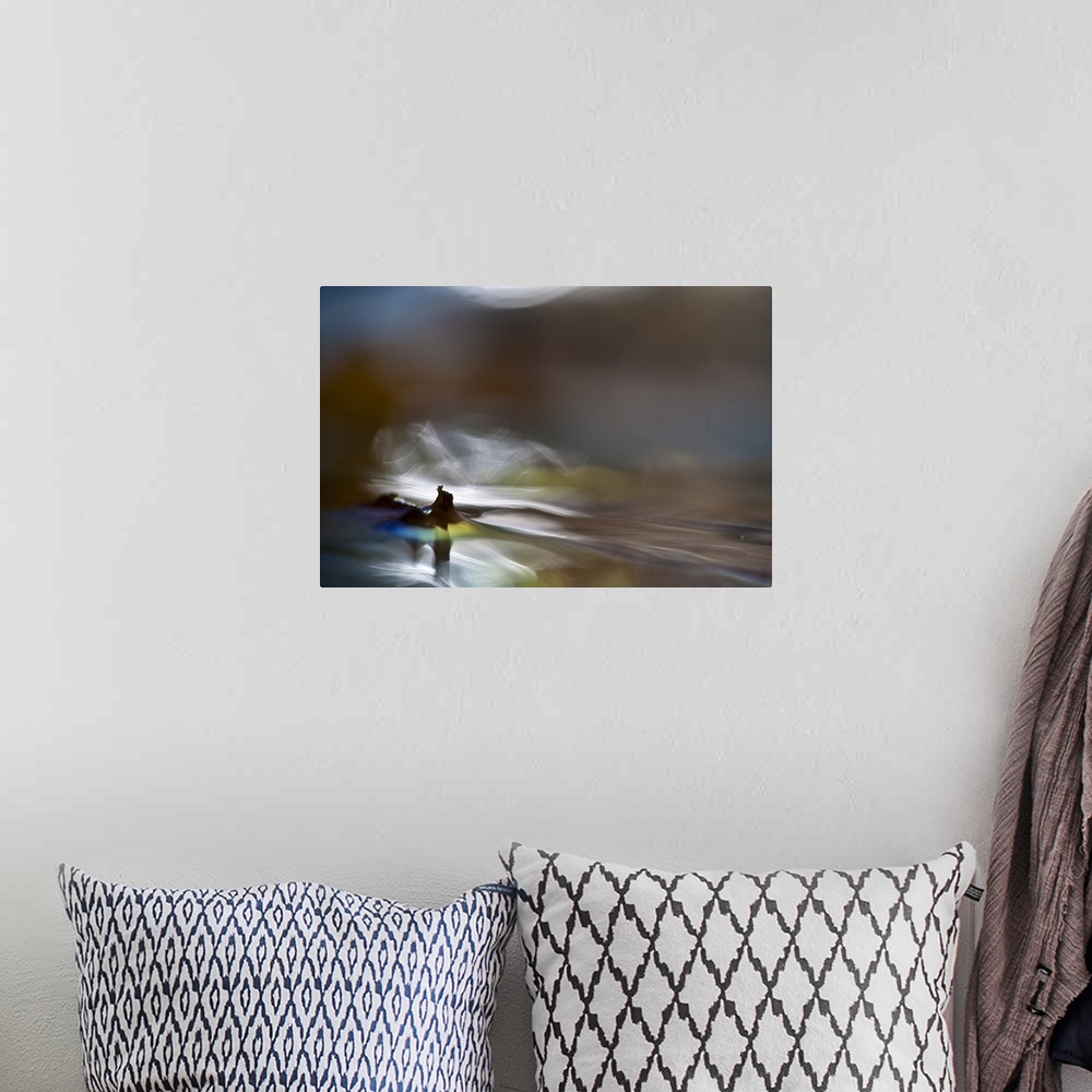 A bohemian room featuring Abstract digital art resembling a waterscape.