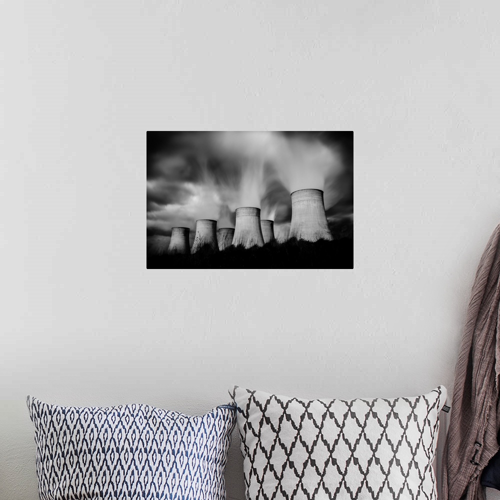 A bohemian room featuring black and white image of several cooling towers near Nottingham, England.