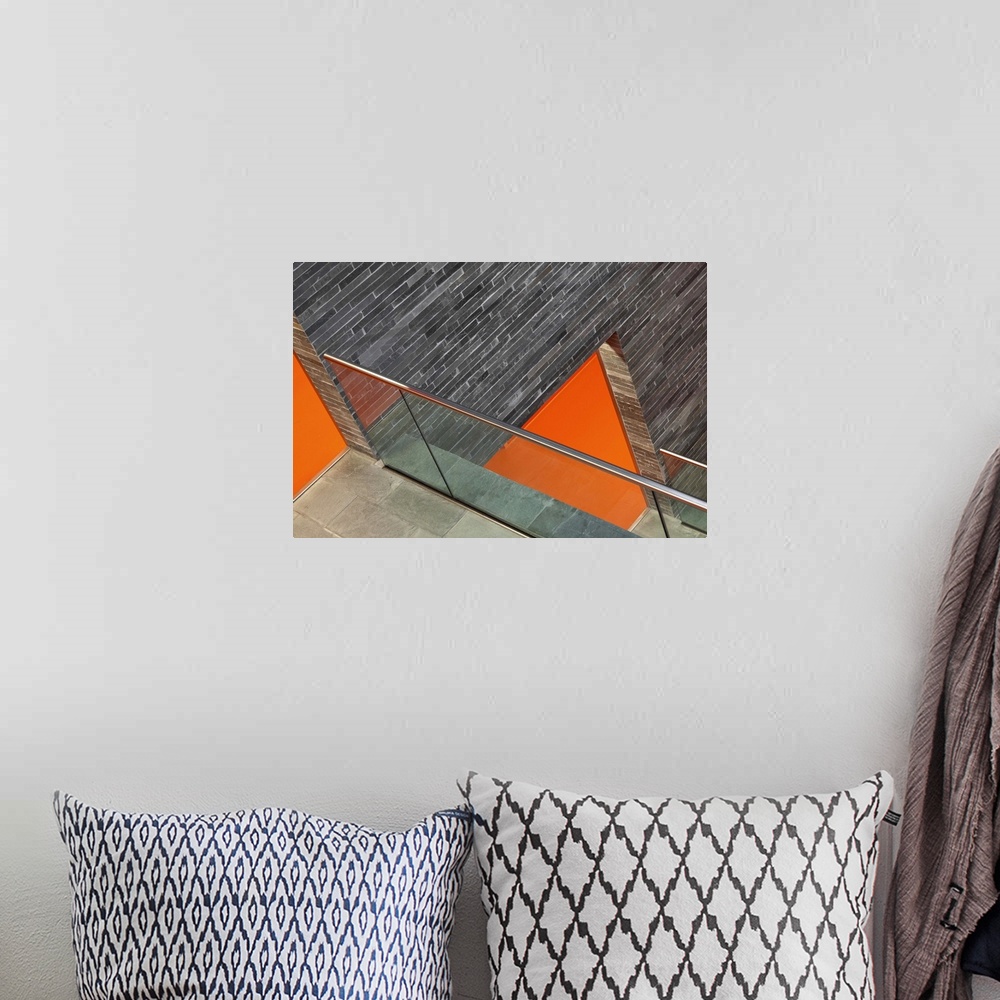 A bohemian room featuring Abstract image of the brick walls and orange floors of a museum in Hilversum, Netherlands.