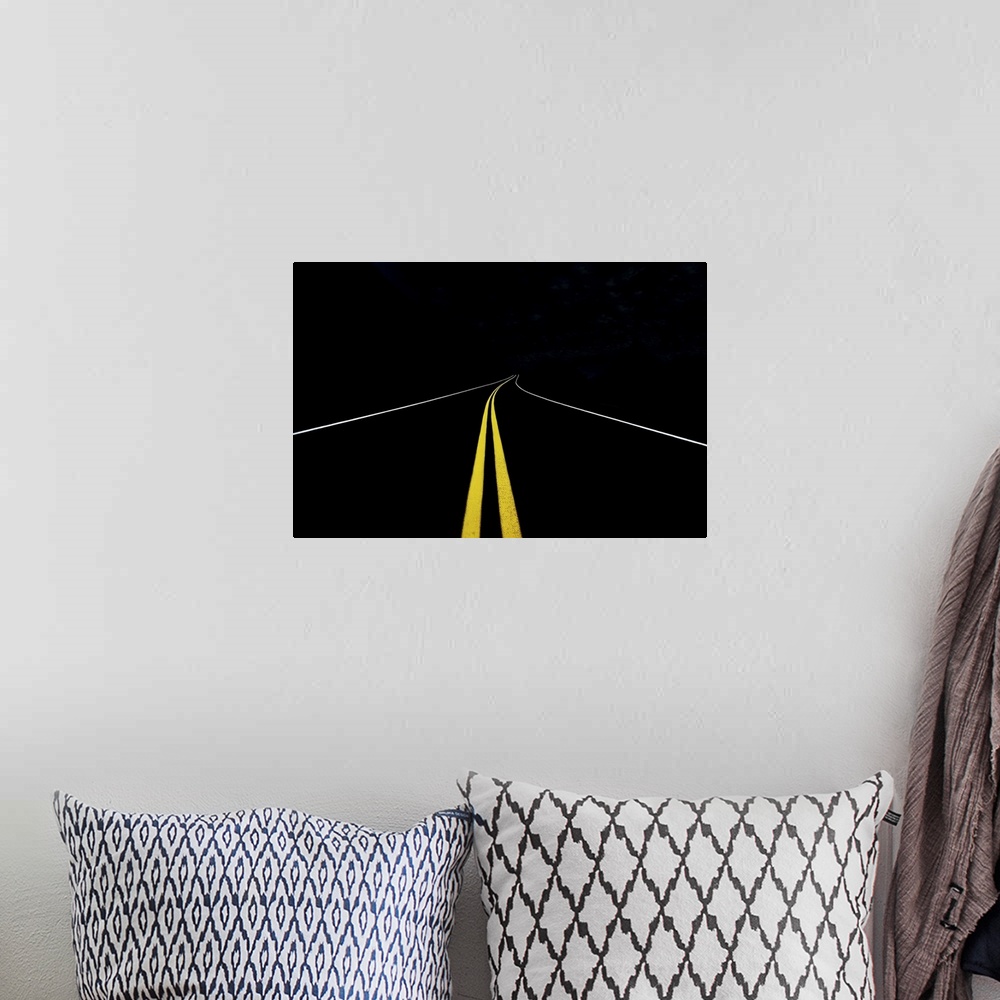 A bohemian room featuring Minimalist image of a road with yellow and white traffic lines.