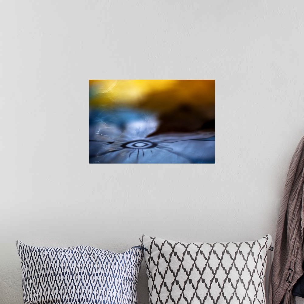 A bohemian room featuring Abstract digital art resembling a flower in water.