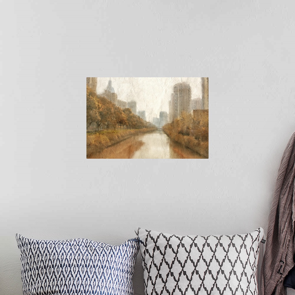 A bohemian room featuring Fall scene of a river in a city with skyscrapers and orange trees.