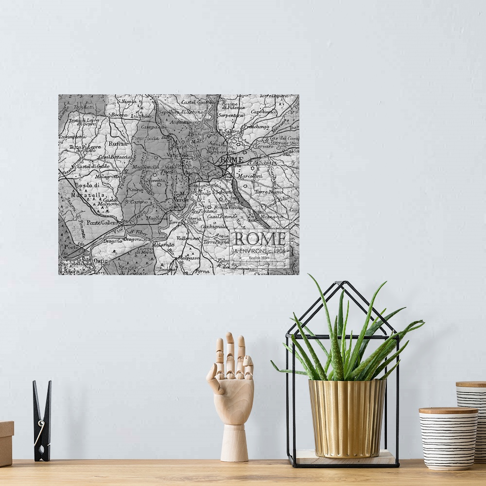 A bohemian room featuring Rustic contemporary art map of Rome districts, in black and white.