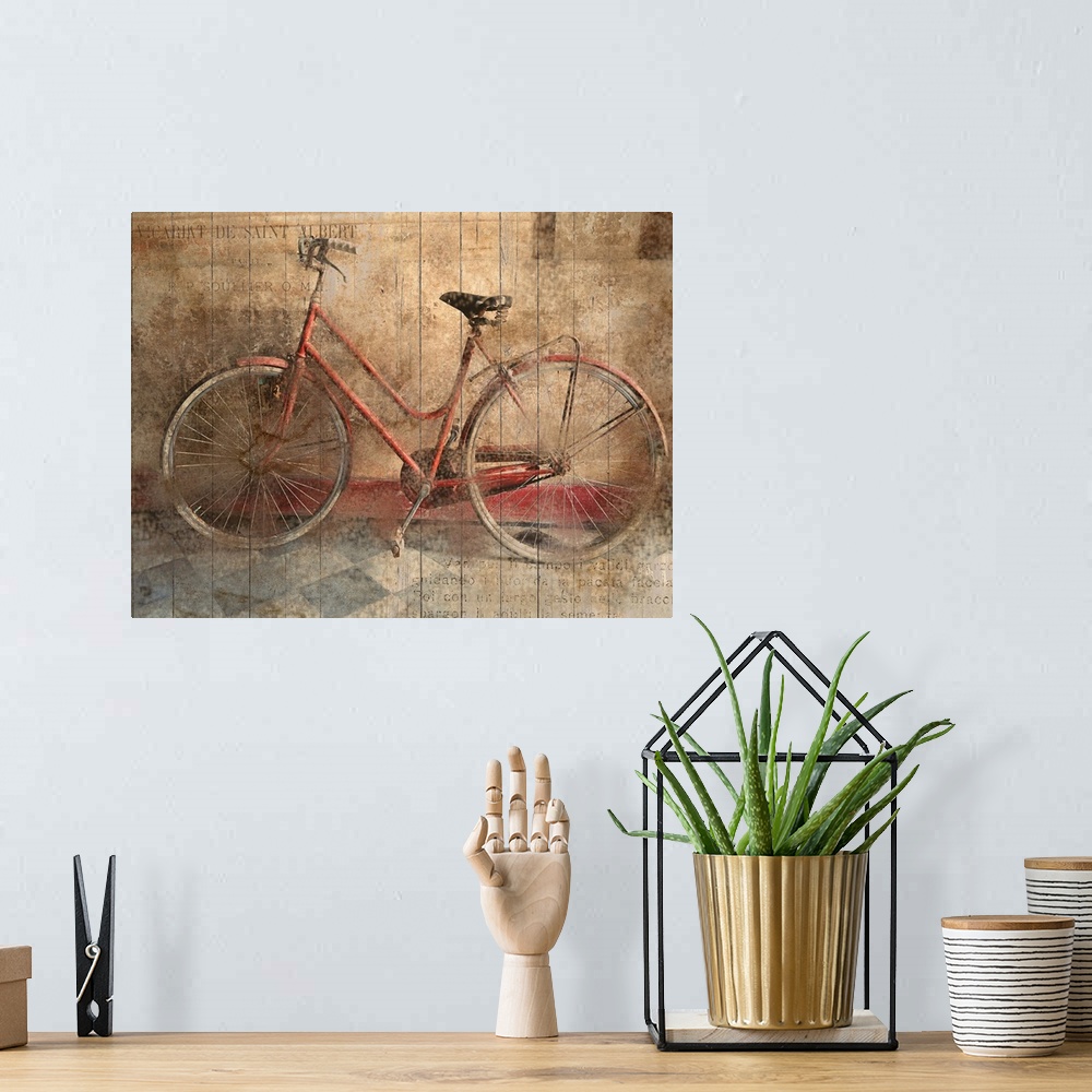 A bohemian room featuring An old bicycle leaning against a wall in low light.