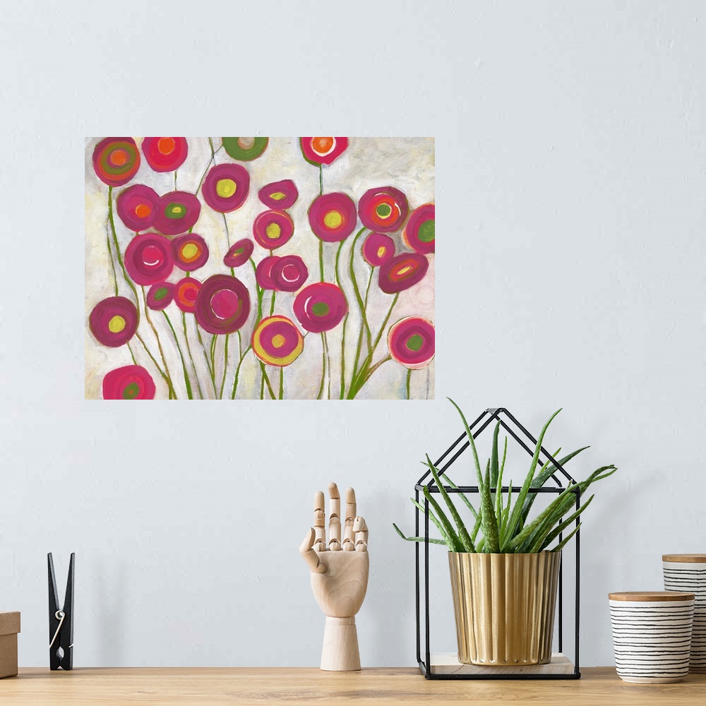 A bohemian room featuring Contemporary abstract painting resembling red flowers.