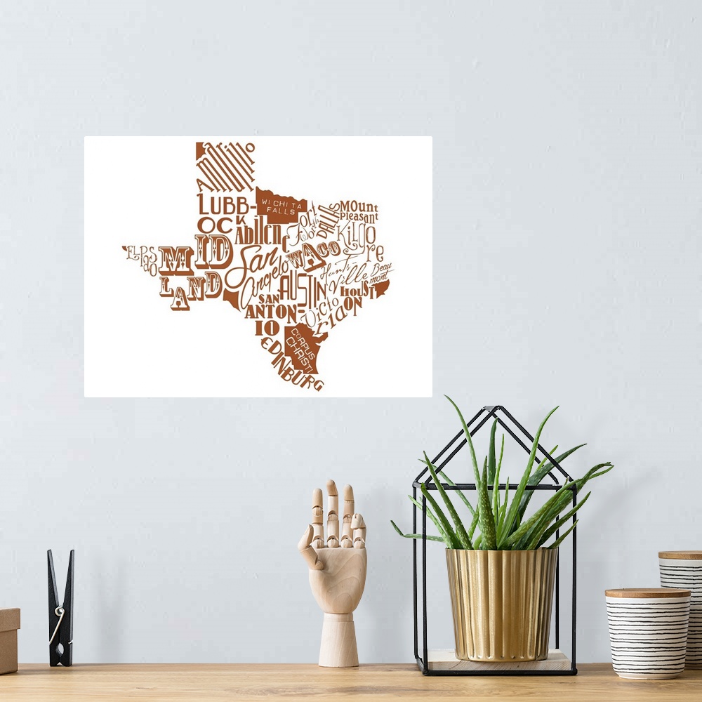 A bohemian room featuring Contemporary painting using typography to make the shape of the state of Texas.