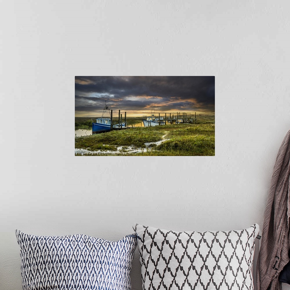 A bohemian room featuring Boats at Thornham creek in Norfolk.