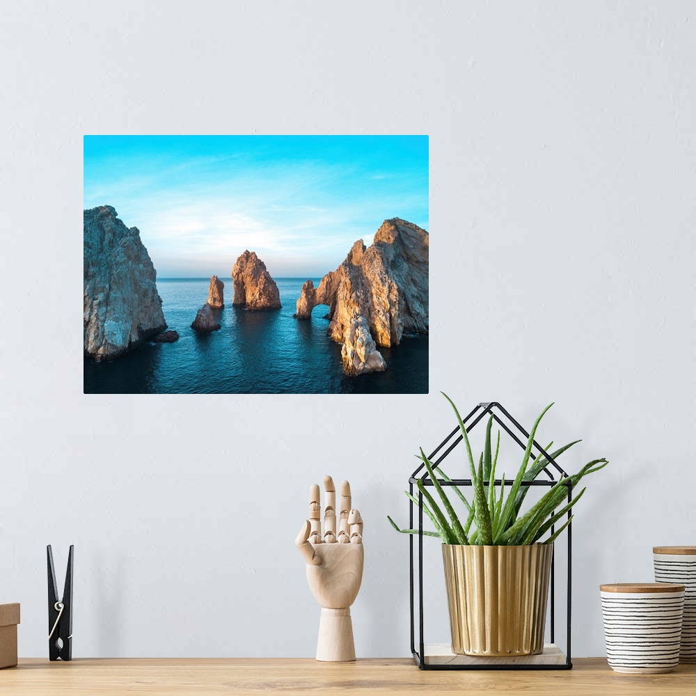 A bohemian room featuring Dramatic rock formations and Arcos de Cabo San Lucas (Arch of Cabo San Lucas) on the coast at Lan...