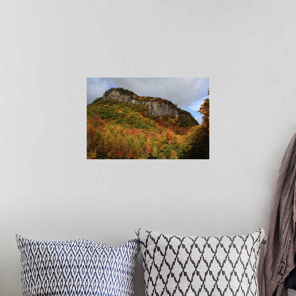 A bohemian room featuring Scenic view of fall foliage and exposed rock on a hillside in the White Mountains, New Hampshire....
