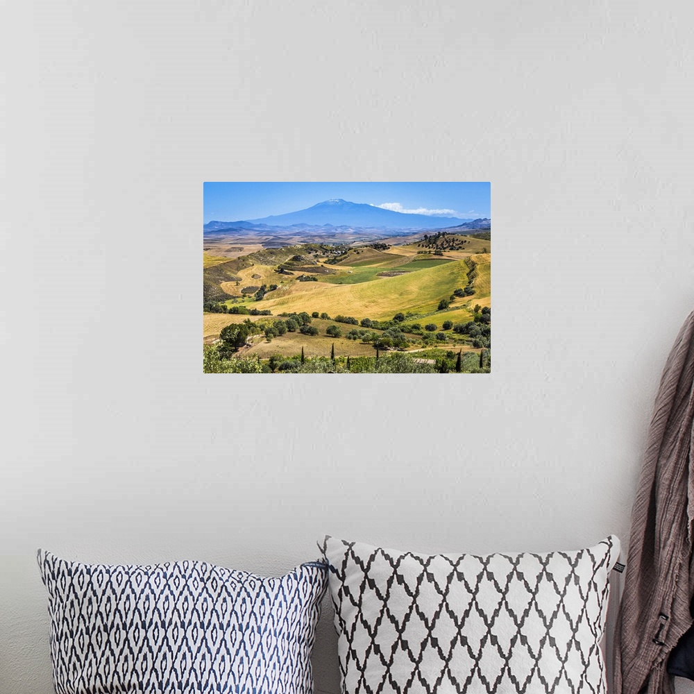 A bohemian room featuring Farmland with Mount Etna in the background near San Michele di Ganzaria, Sicily, Italy
