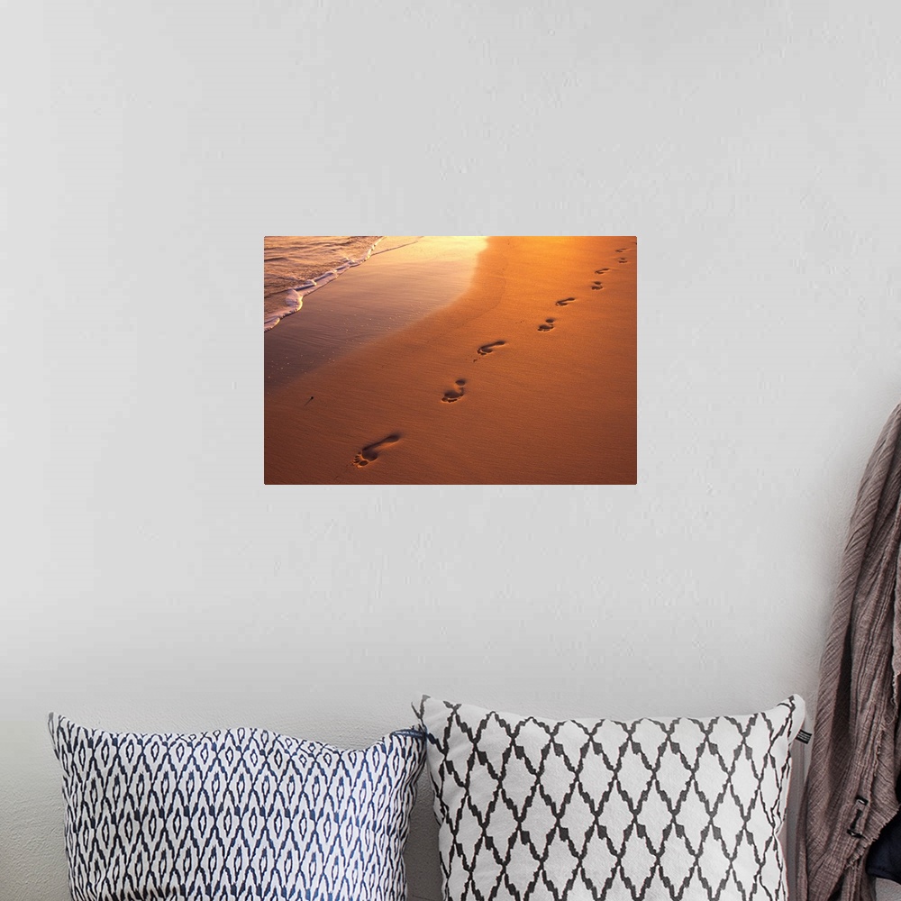 A bohemian room featuring Footprints In Sand At Sunset